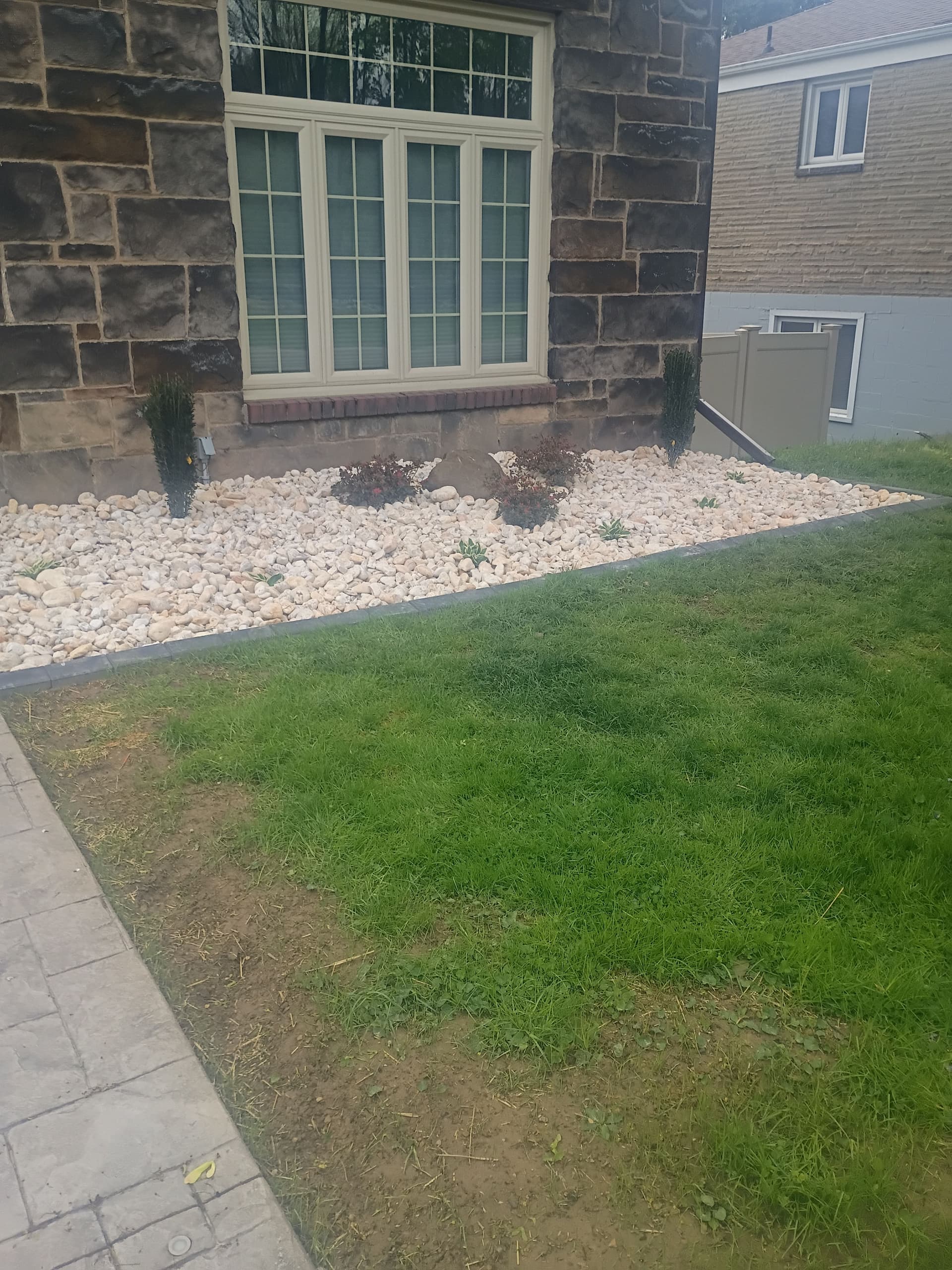 Gallery photos for Garden Bed Makeover with Holland Paver Borders and River Rock: Image #5