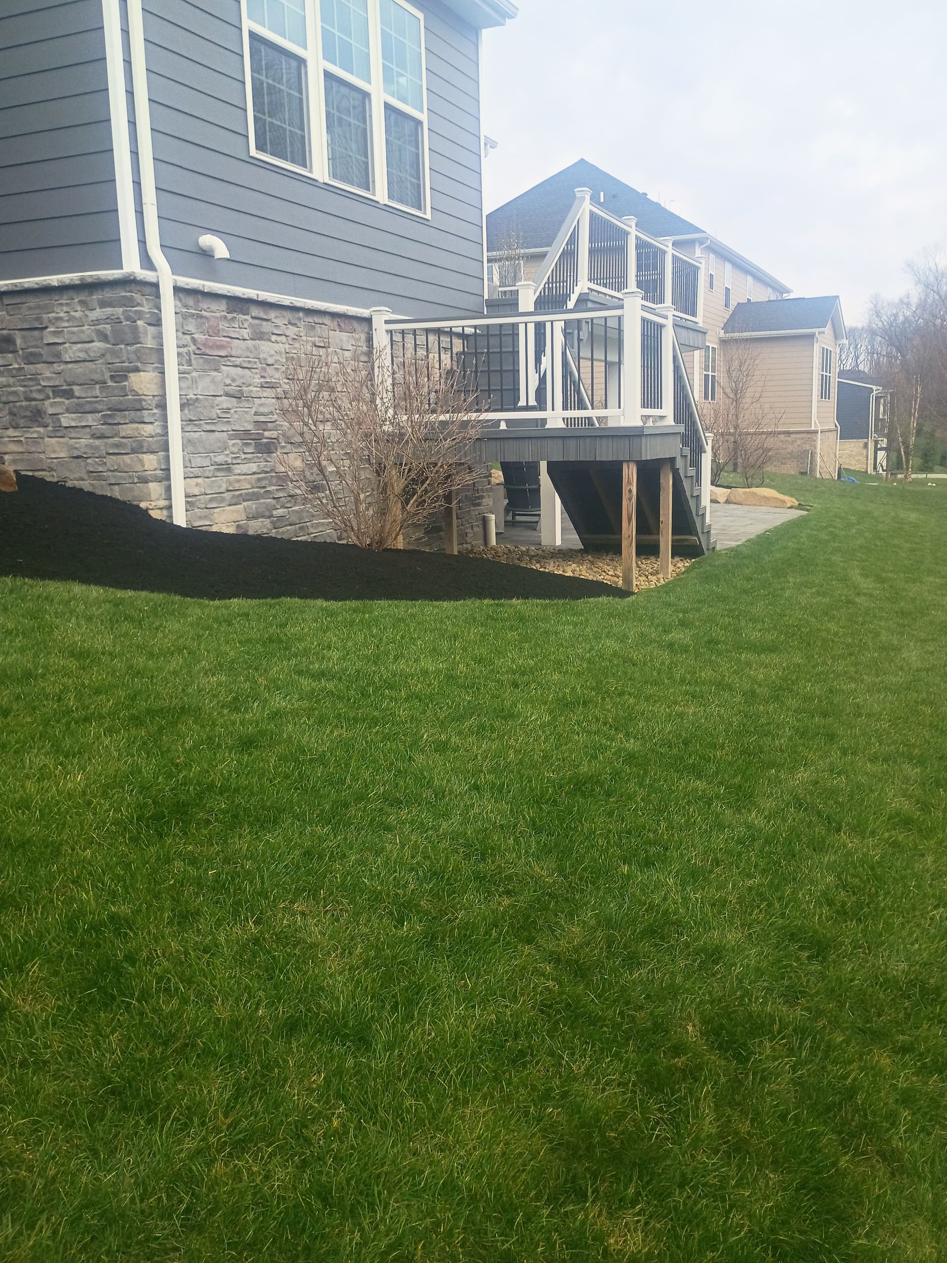 Gallery photos for Black Mulch, Boulder Accents and a Paver Patio Done Right: Image #2