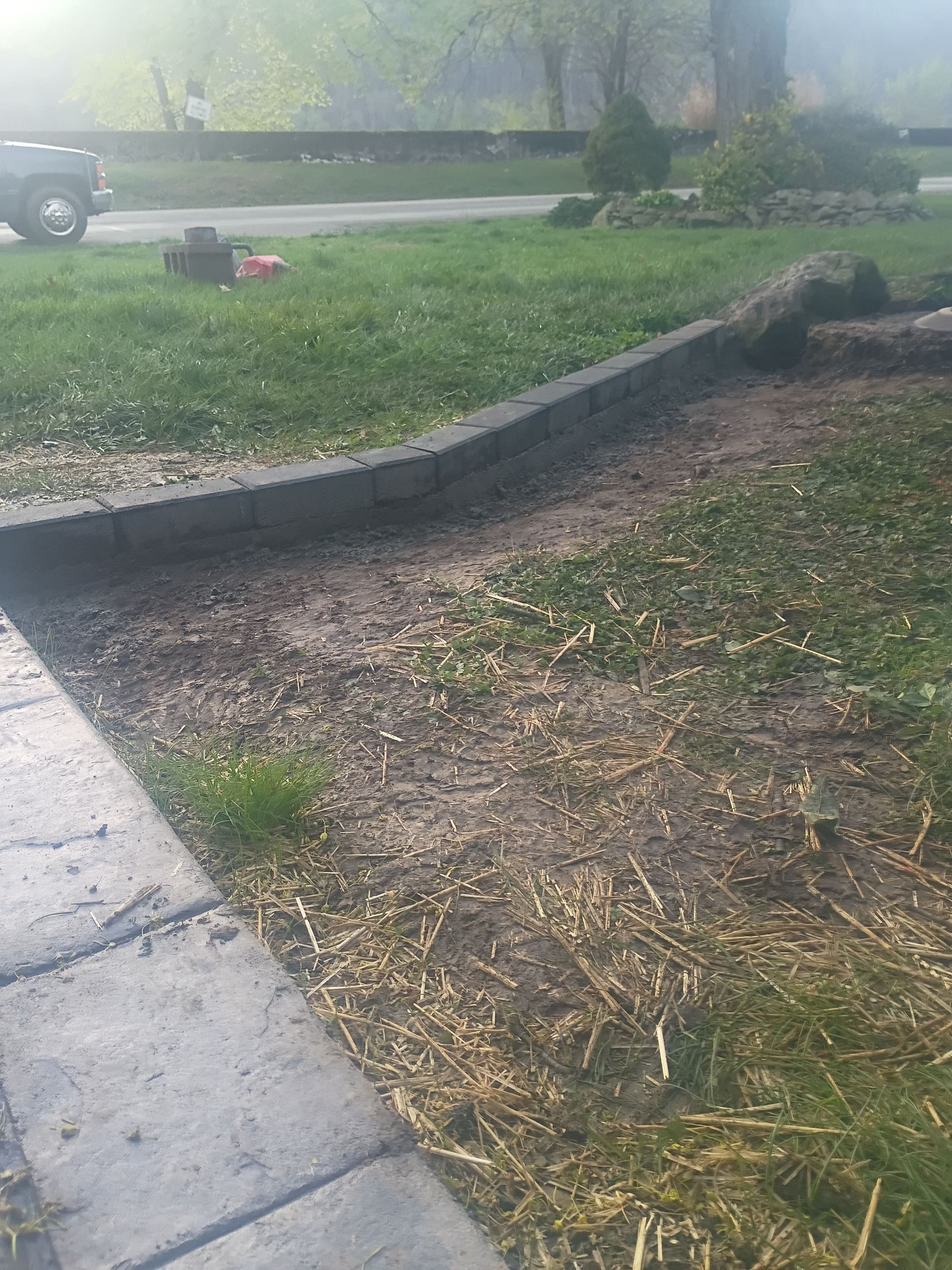 Gallery photos for Garden Bed Makeover with Holland Paver Borders and River Rock: Image #1