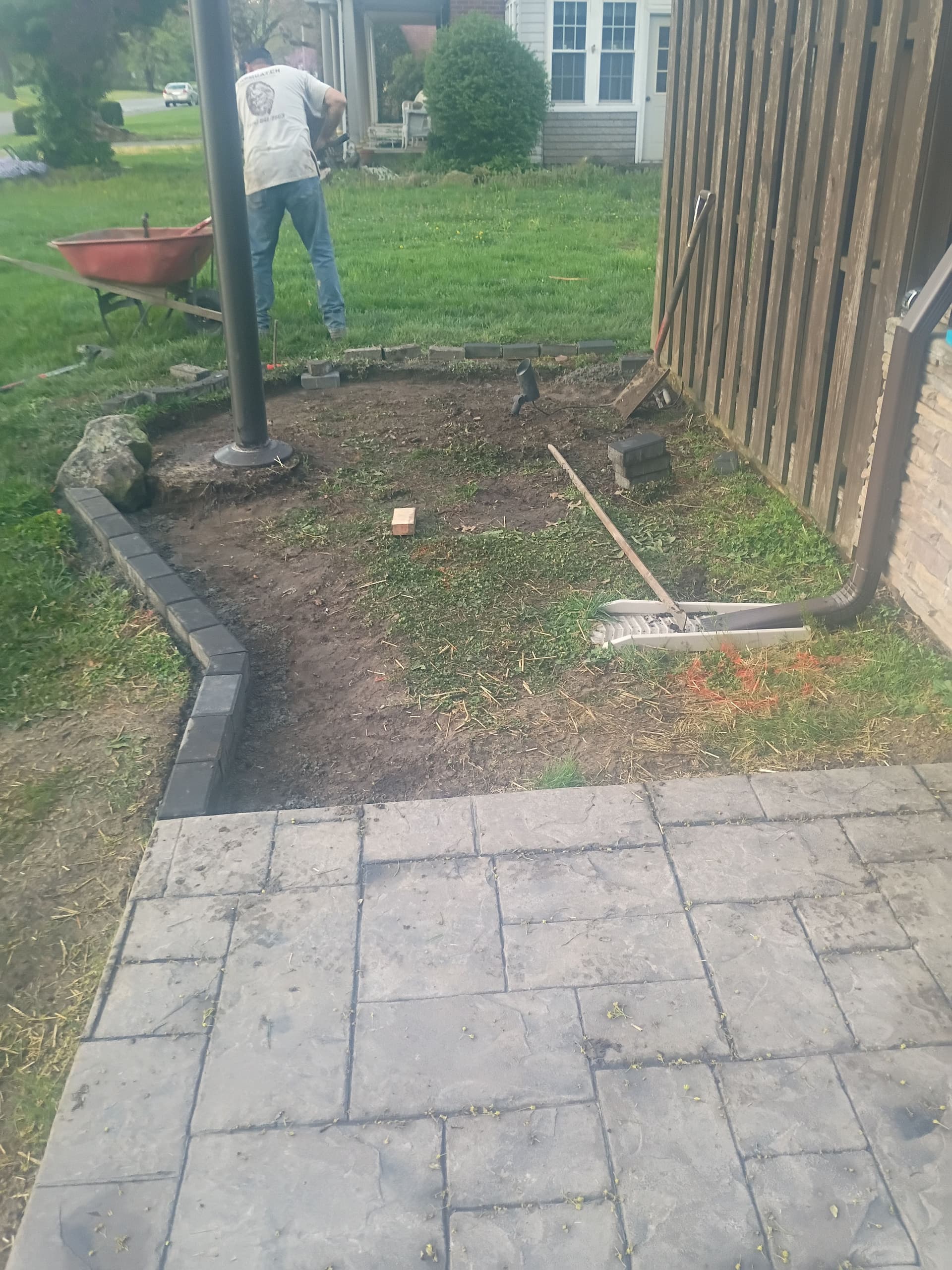 Garden Bed Makeover with Holland Paver Borders and River Rock image