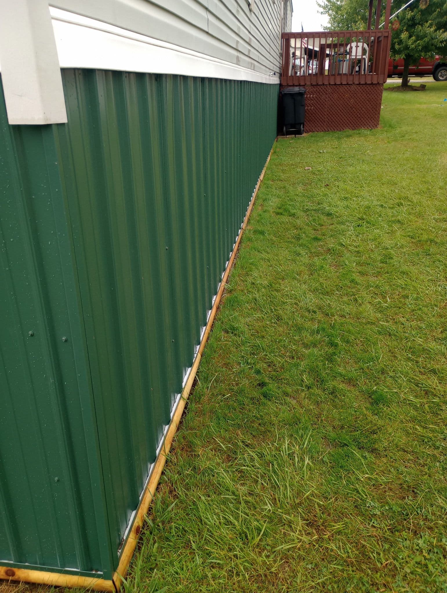 Sturdy Green Metal Skirting for Enhanced Durability image