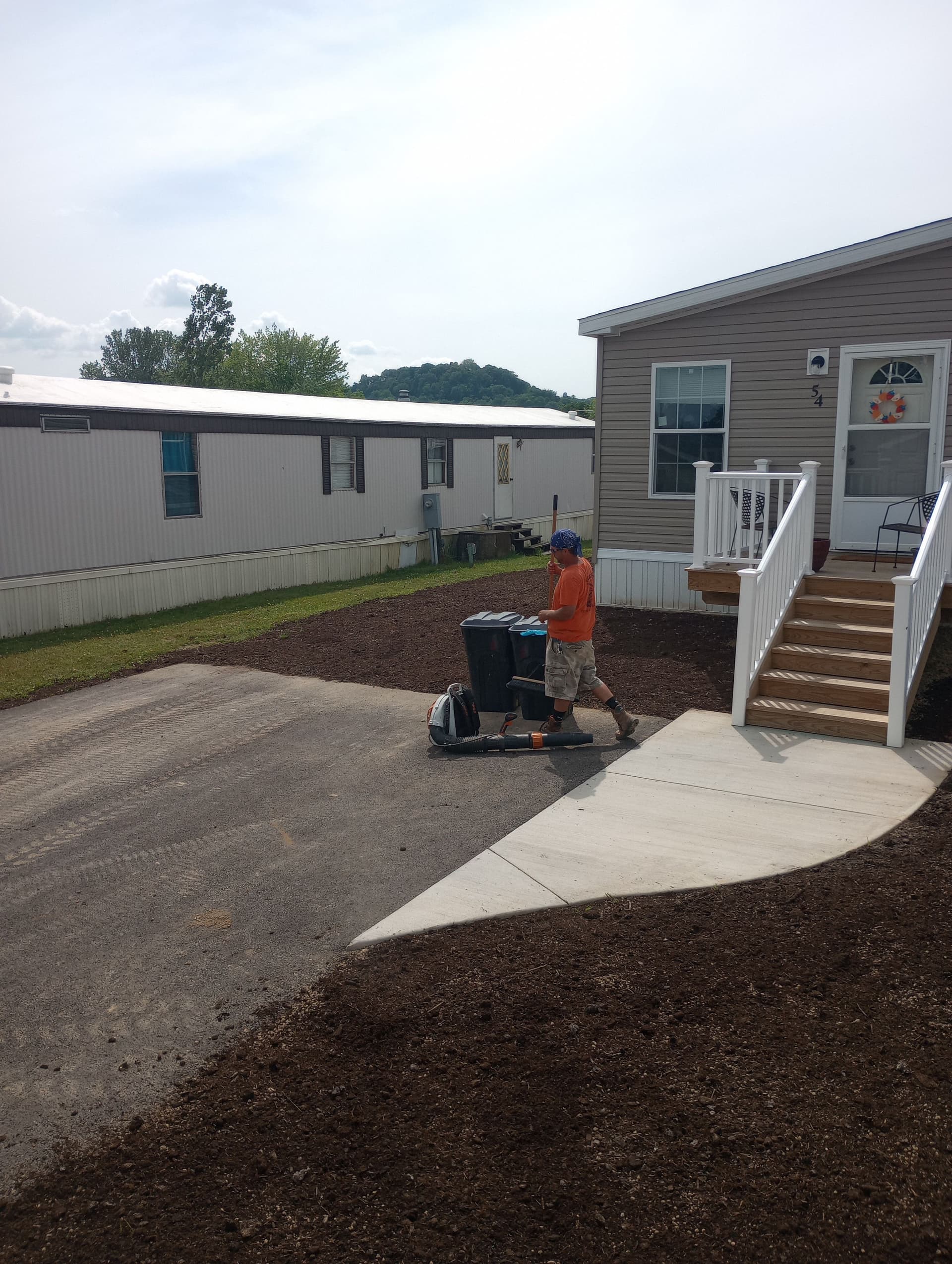 Gallery photos for Yard Overhaul with Topsoil and Grass at Local Mobile Homes: Image #2